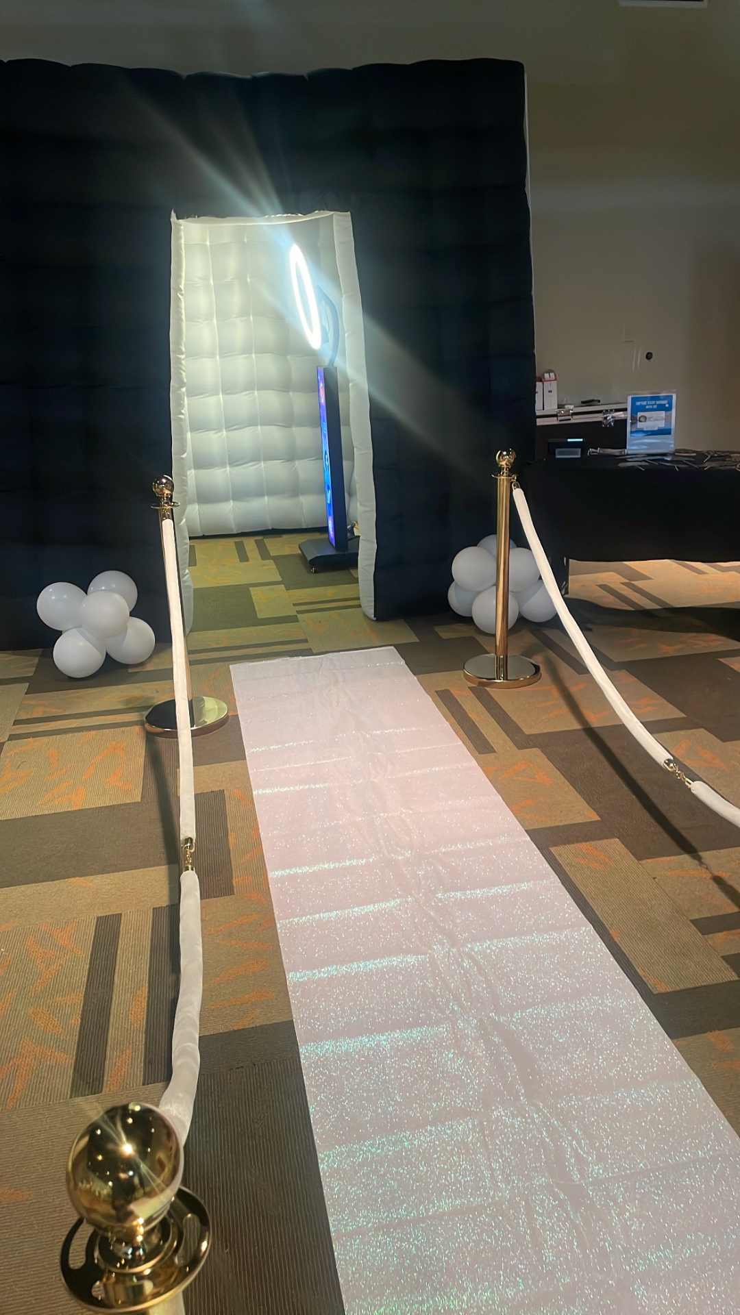 Inside the magazine photo booth room — red carpet entrance